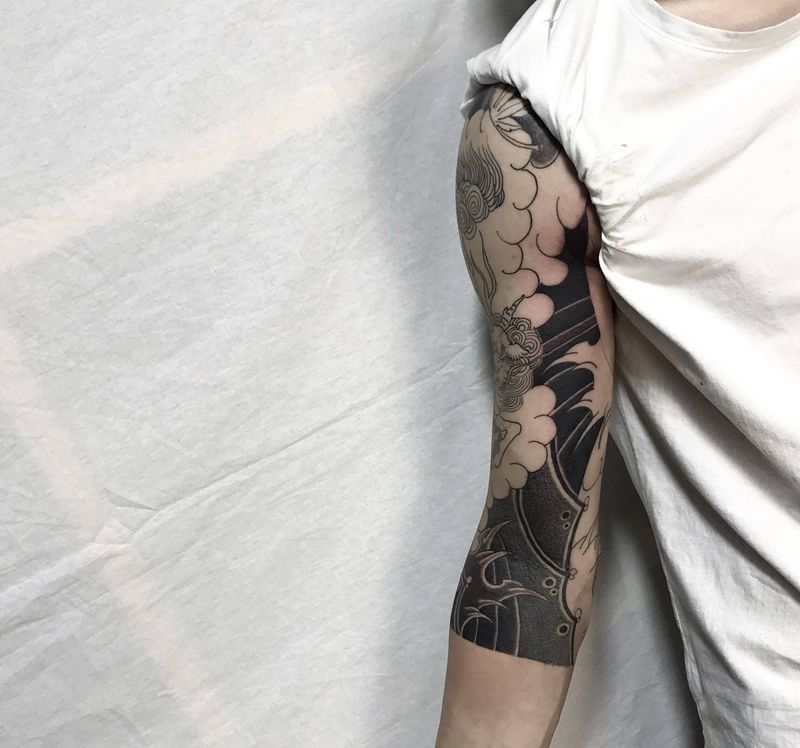 麒麟七分袖纹身图片_手臂老传统纹身图案