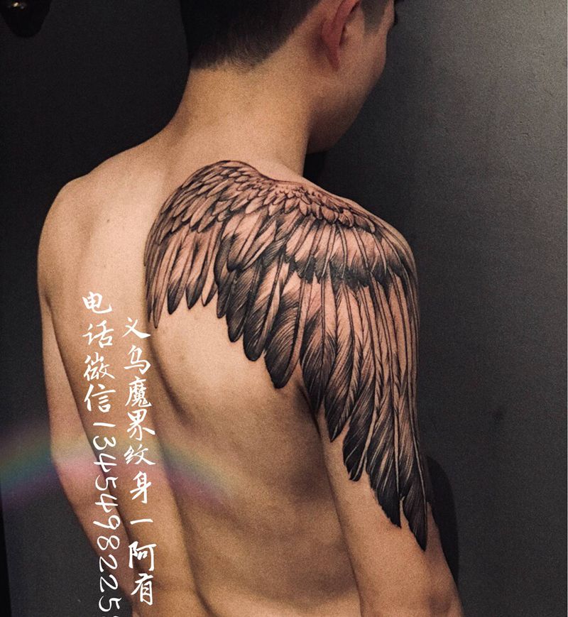 天使之翼翅膀纹身图片_背部肩部欧美写实点刺翅膀天使翅膀纹身图案