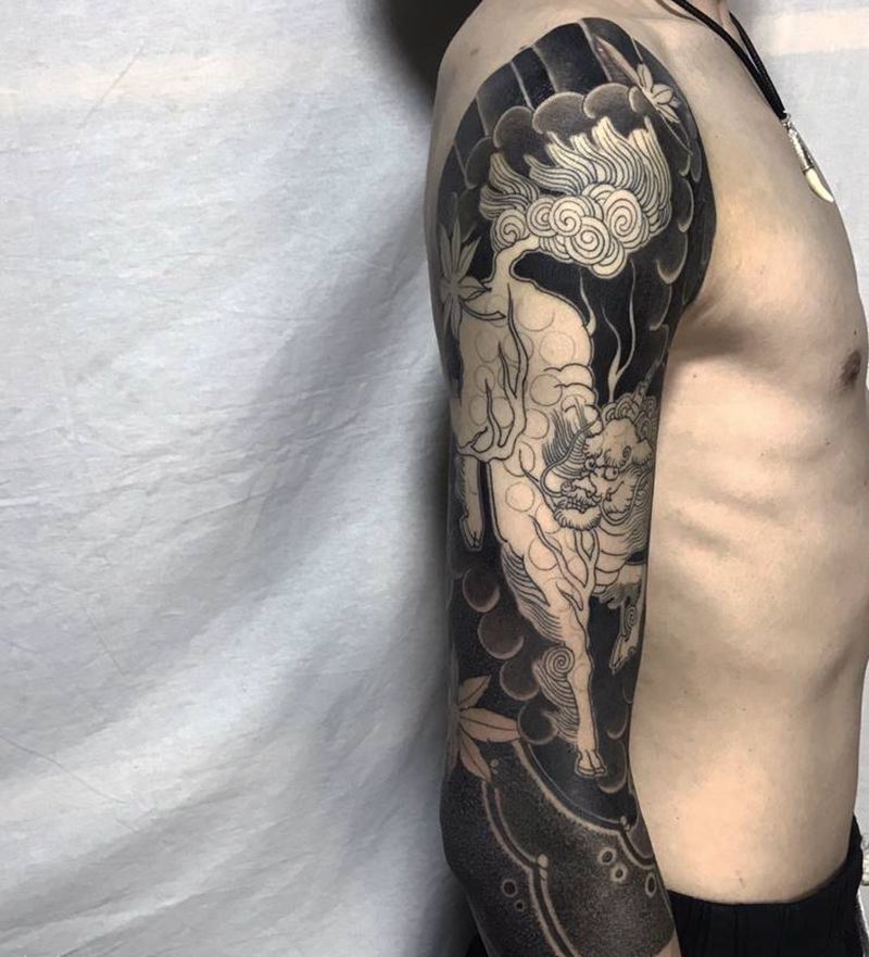 麒麟七分袖纹身图片_手臂老传统纹身图案