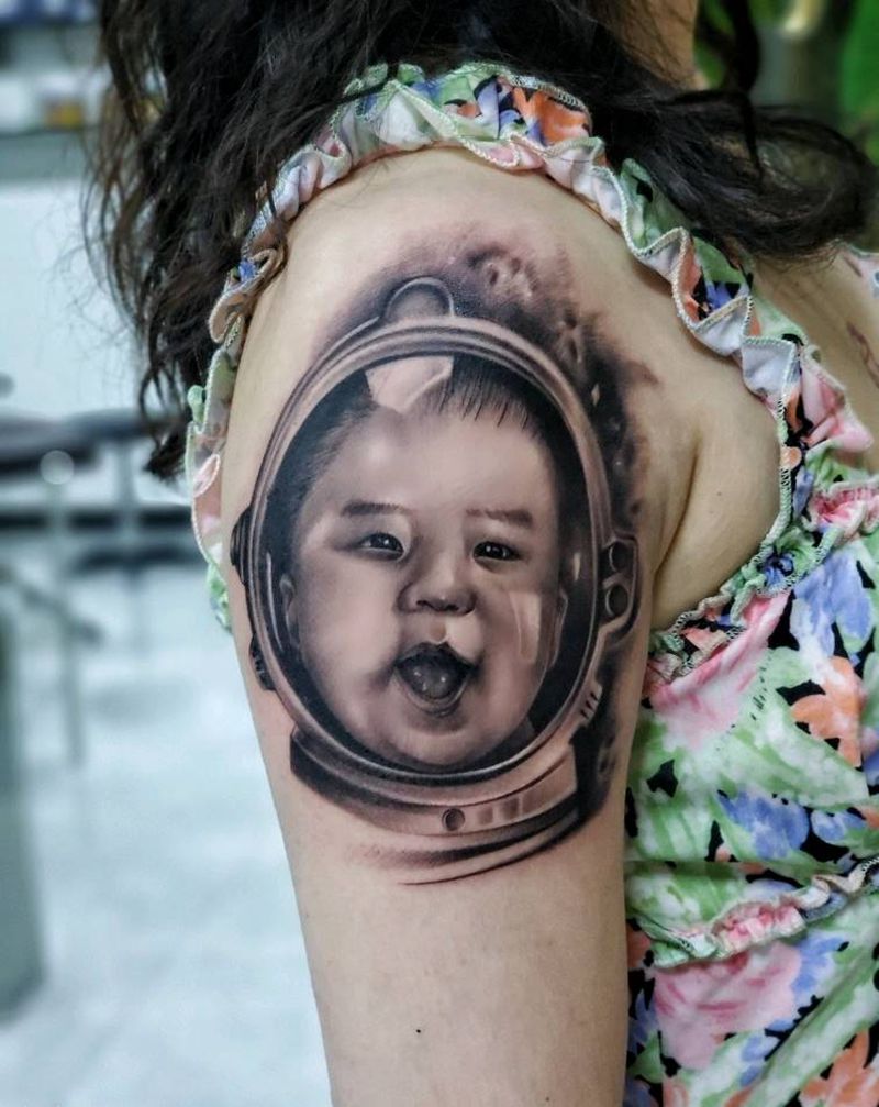 长大要当宇航员纹身图片_手臂欧美写实纹身图案