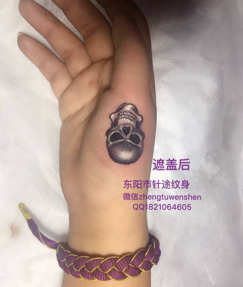 骷髅图盖疤纹身图片