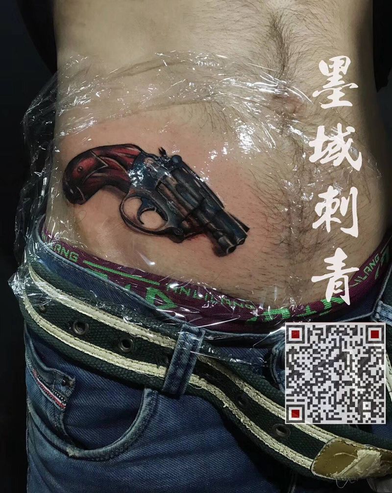 枪纹身图片_几何写实腰部成品纹身图案