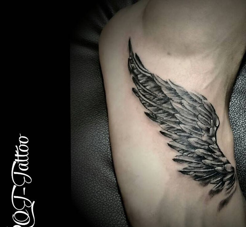 助梦纹身图片_脚部欧美写实成品纹身图案