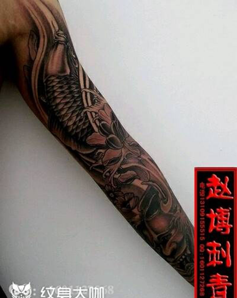 鲤鱼般若包花臂纹身纹身图片_手臂传统原创成品纹身图案