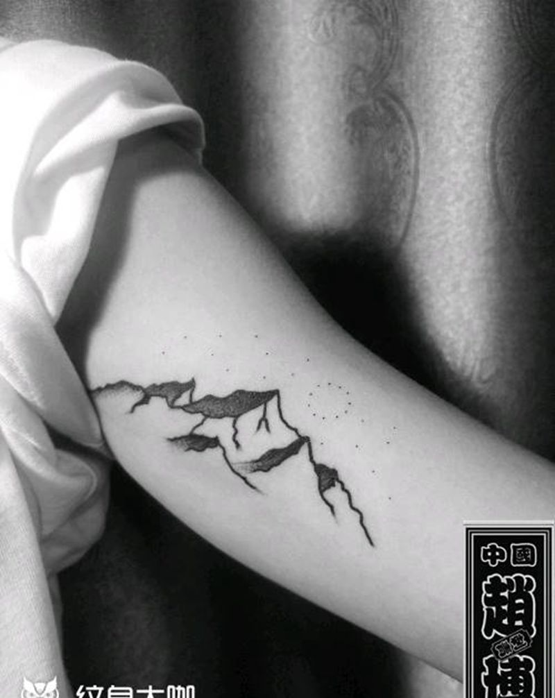 冰川纹身纹身图片_手臂点刺冰川纹身图案