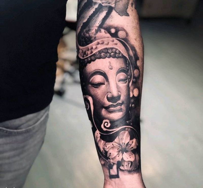 佛纹身图片_手臂欧美写实纹身图案