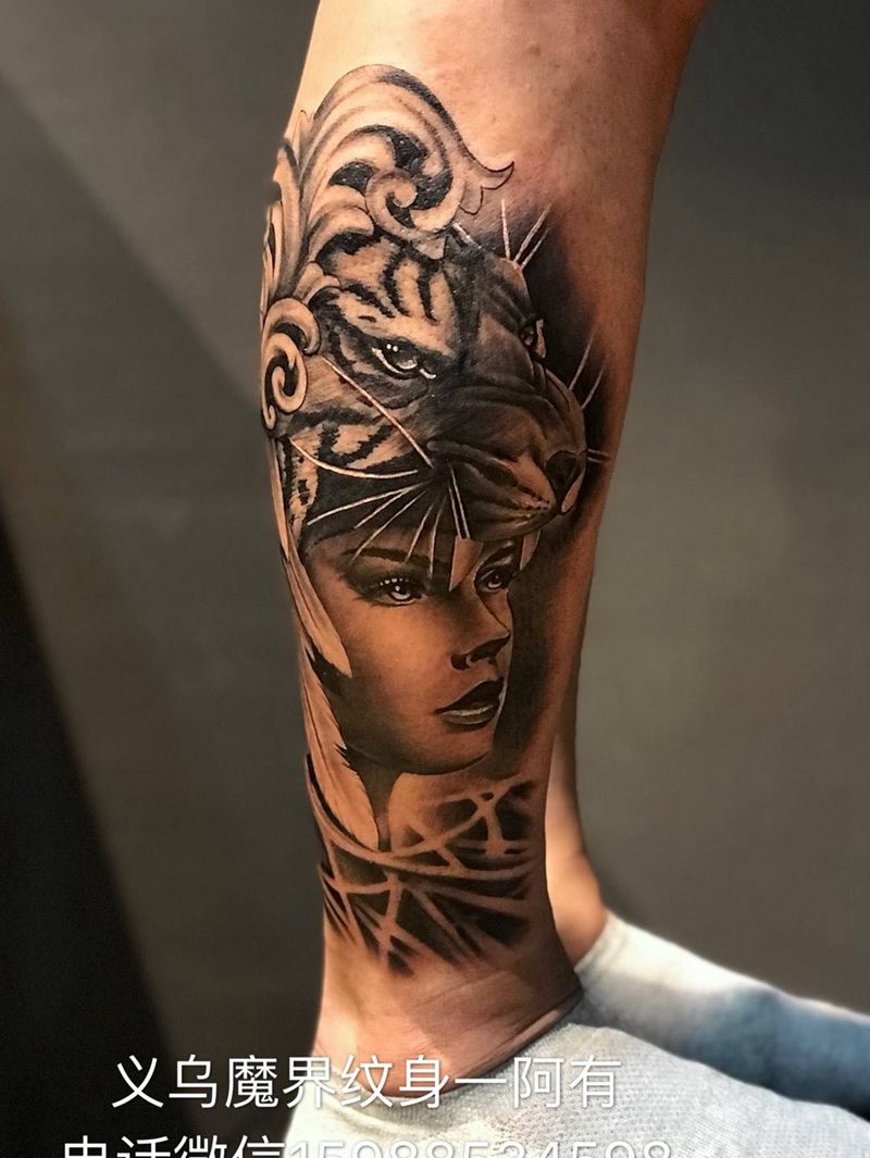 美女虎纹身图片_成品宗教动物人物植物腿部手臂欧美肖像写实纹身图案