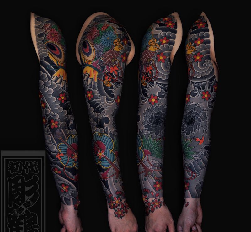 15-16年作品纹身图片_手臂老传统圆三打雾纹身图案