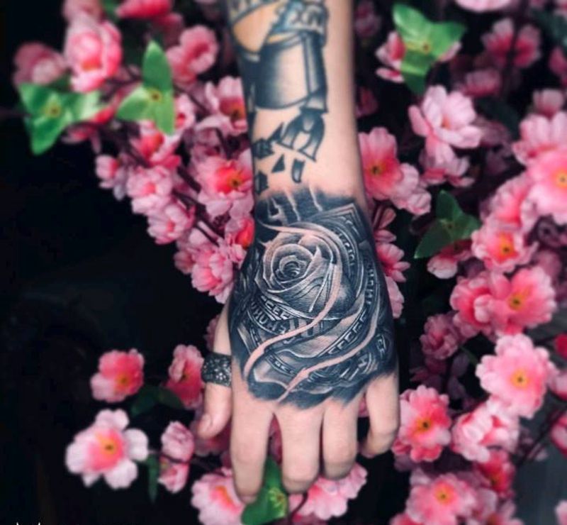 钱多多纹身图片_手臂欧美写实纹身图案