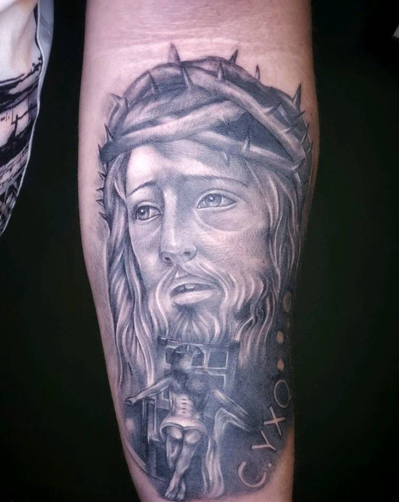 耶稣纹身图片_手臂欧美写实纹身图案