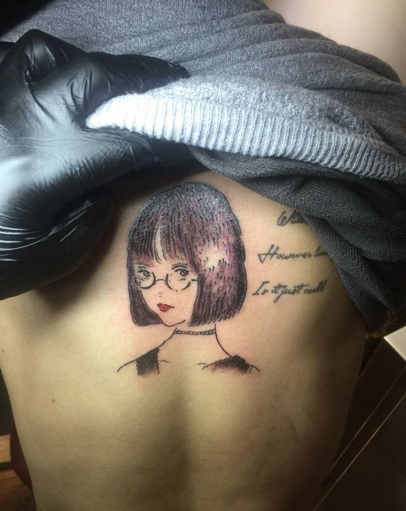 一位帅哥的动漫女神纹身图片