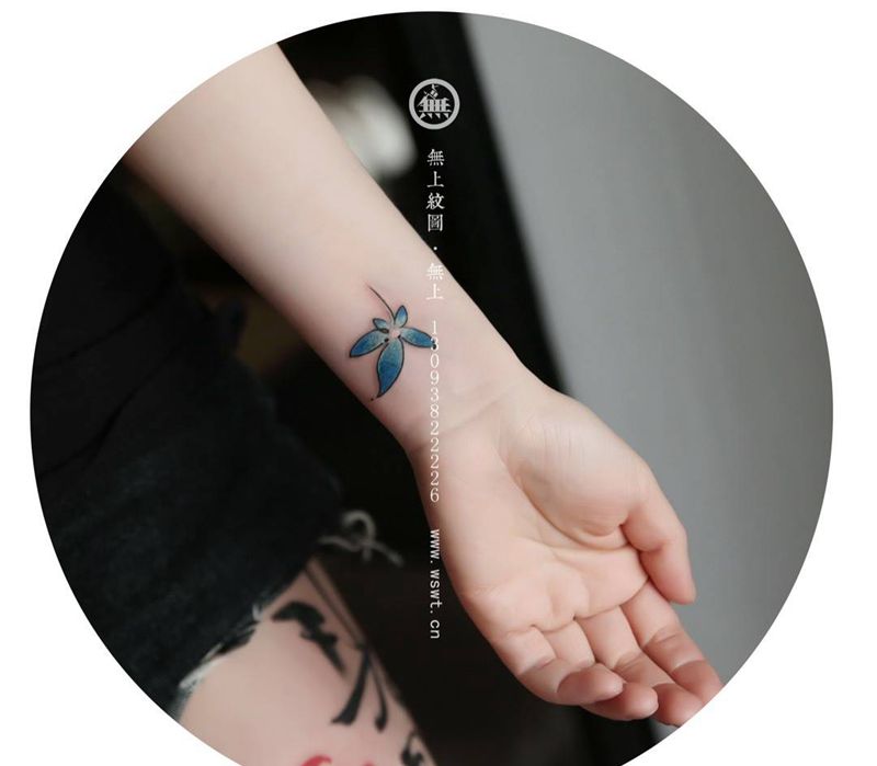 手腕小图纹身图片_成品手臂手部传统植物无上纹图纹身图案
