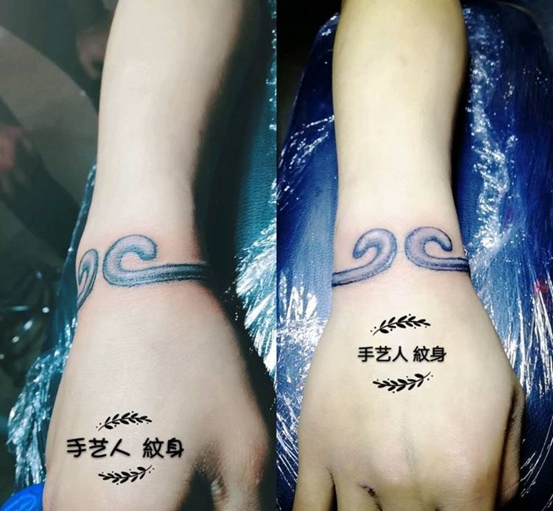 紧箍⭕纹身图片_手臂传统字符纹身图案