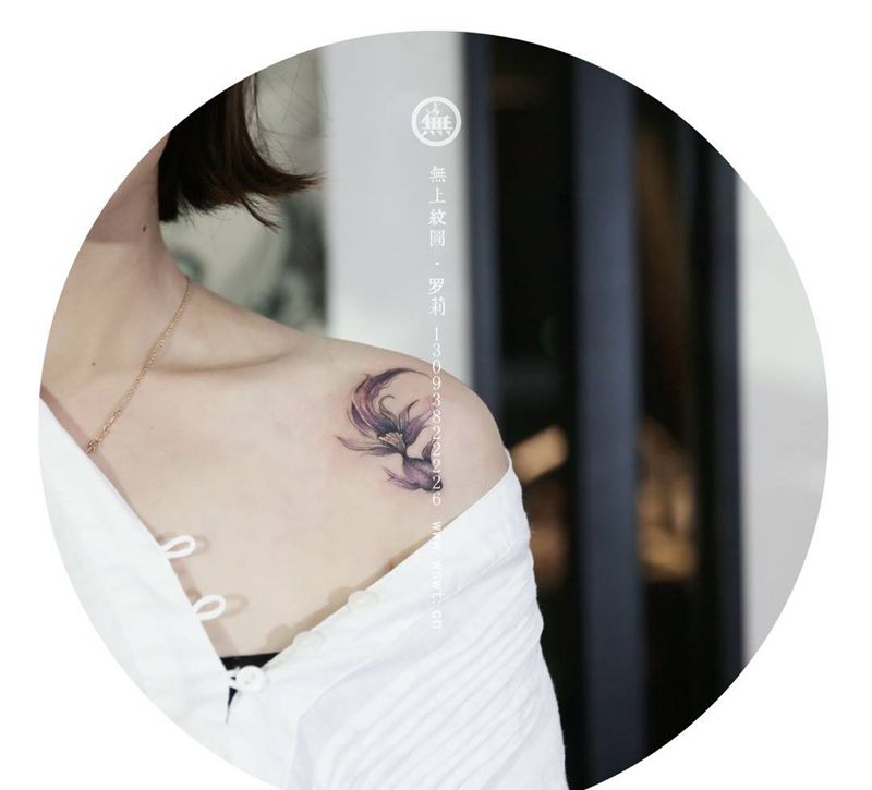 金鱼纹身纹身图片_成品胸部手臂欧美清新动物无上纹图招生纹身图案