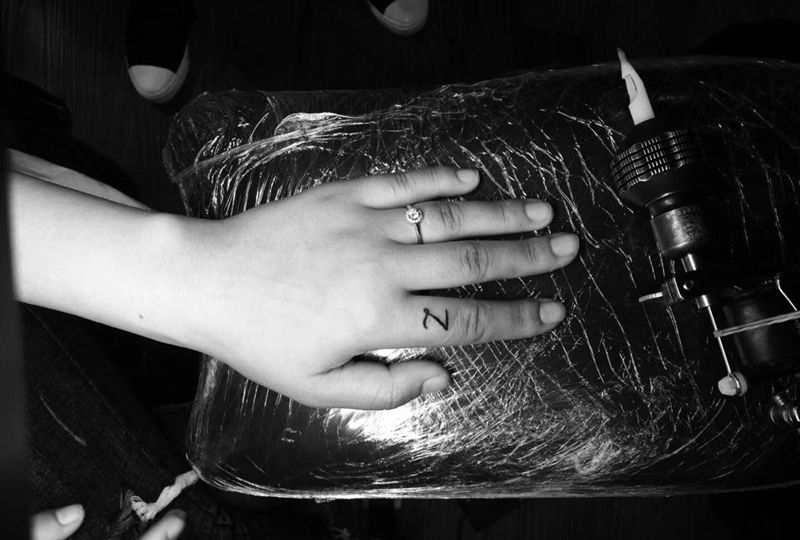 小手指纹身图片