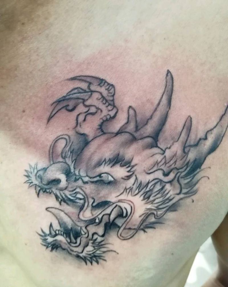 手绘龙头纹身图片_胸部新传统纹身图案