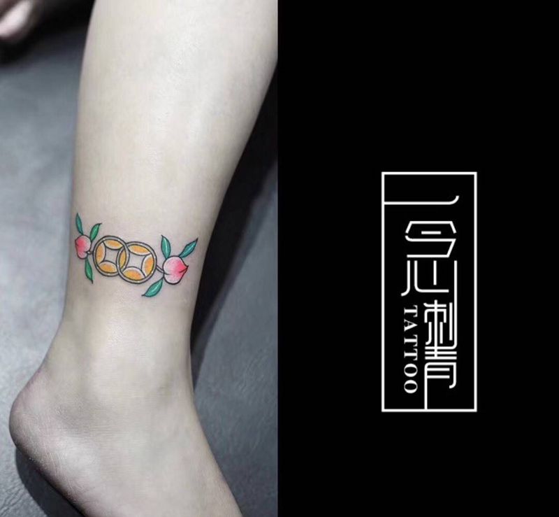 铜板桃子纹身图片