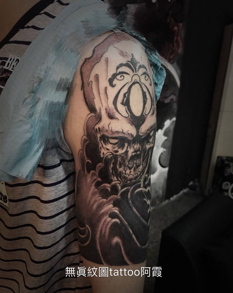 遮盖骷髅头纹身图片