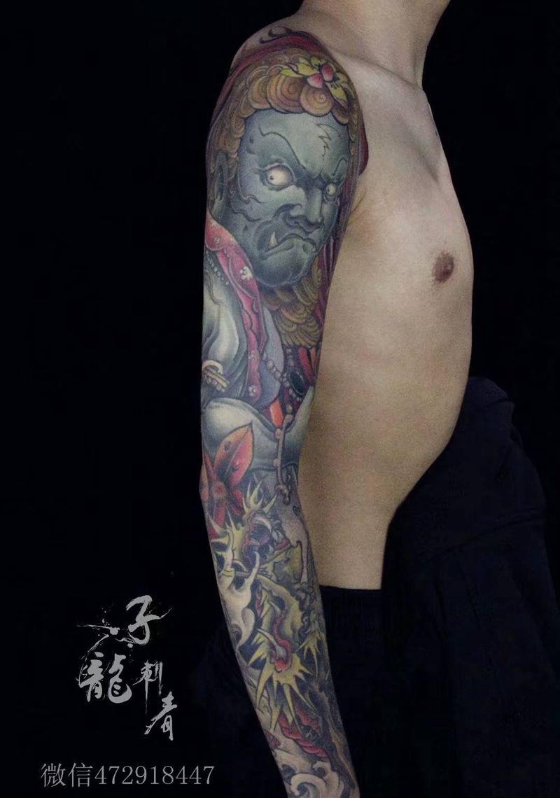 不动冥王纹身图片_手臂新传统纹身图案