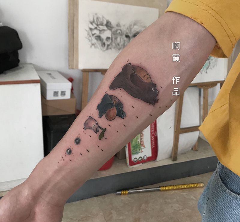 龙猫纹身图片_手臂纹身图案