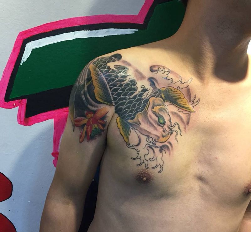 鲤鱼遮盖纹身图片