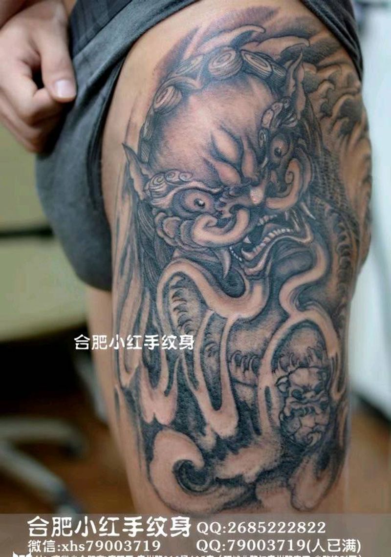 大腿唐狮纹身图片