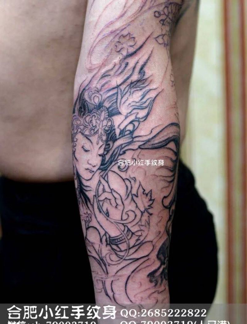 花臂进行中纹身图片