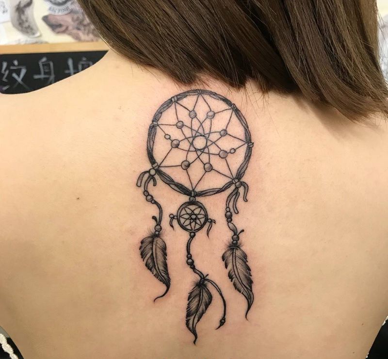 后背捕梦网纹身图片