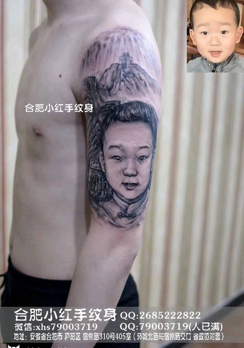 大臂肖像纹身图片