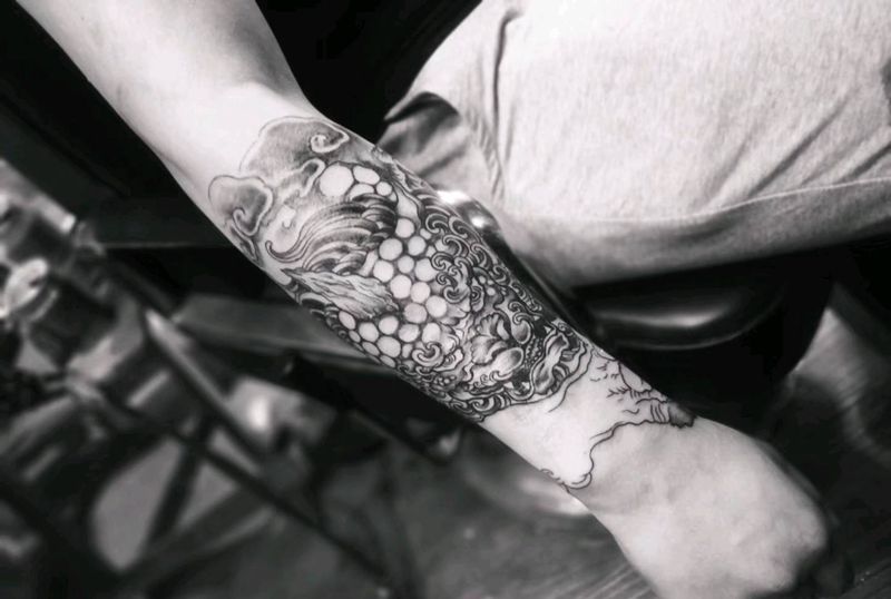 唐狮纹身图片_手臂纹身图案