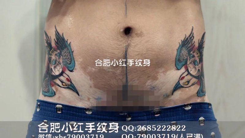 小腹双飞燕纹身图片