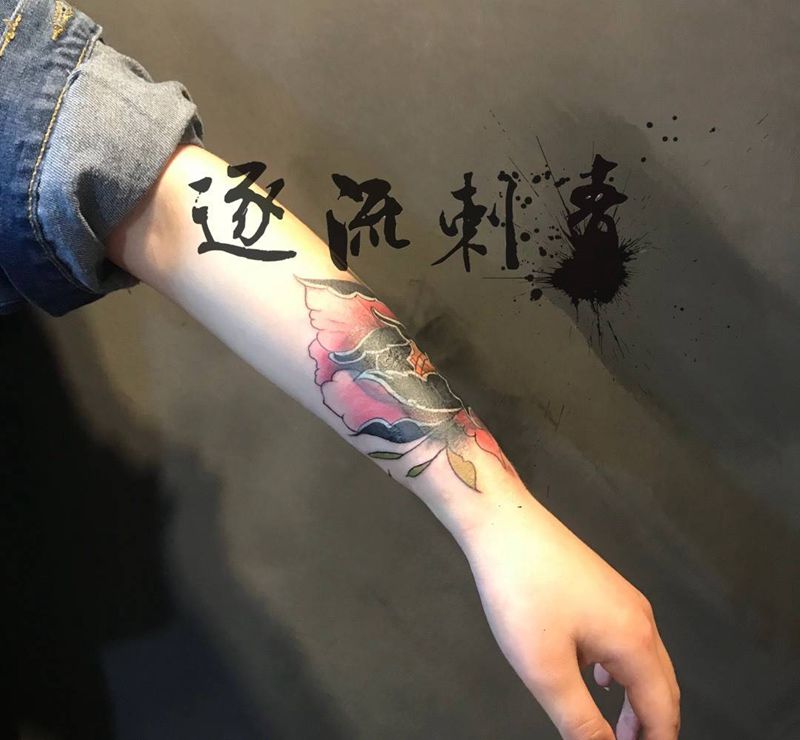 牡丹花遮盖纹身图片_手臂纹身图案