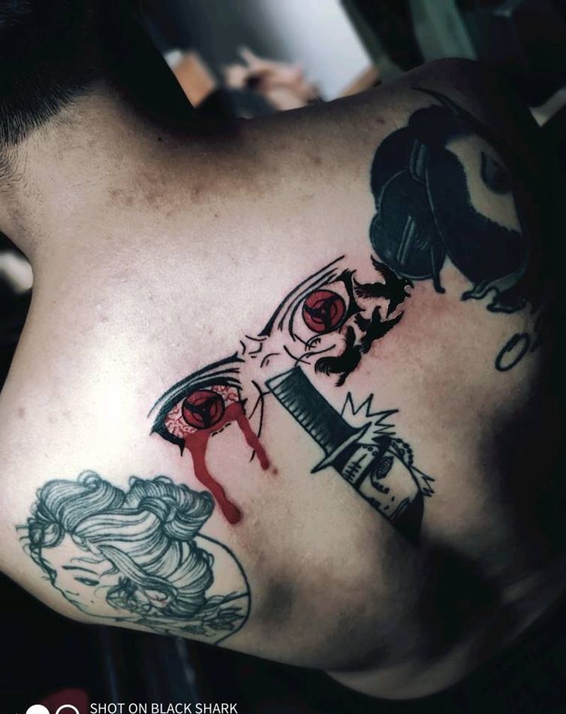 写轮眼纹身图片_背部纹身图案