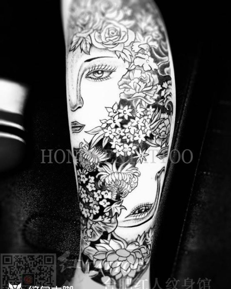 唯美小花腿纹身图片