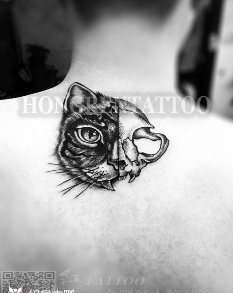 两面…纹身图片