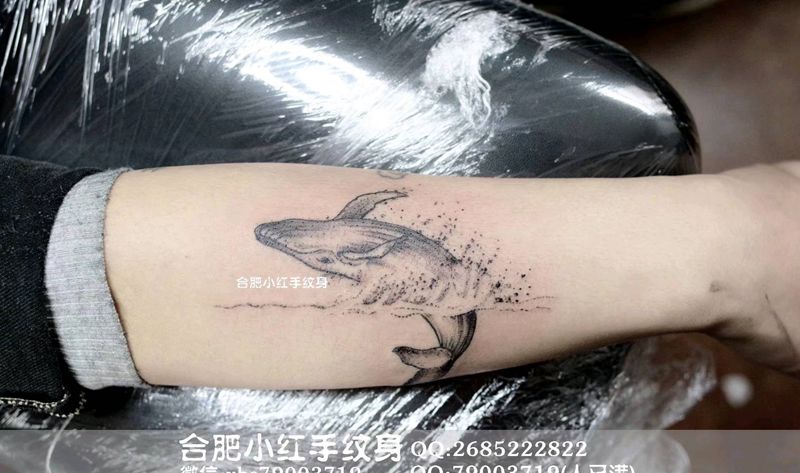 小作纹身图片_手臂点刺纹身图案