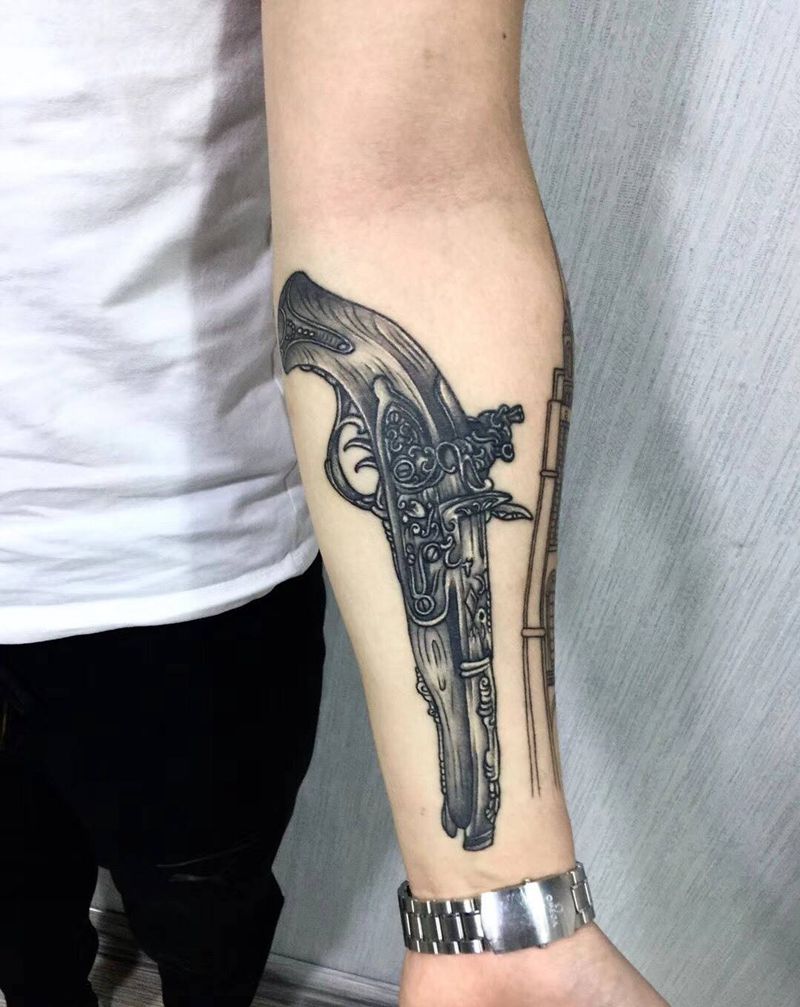 燧发枪纹身图片_成品手臂欧美静物纹身图案
