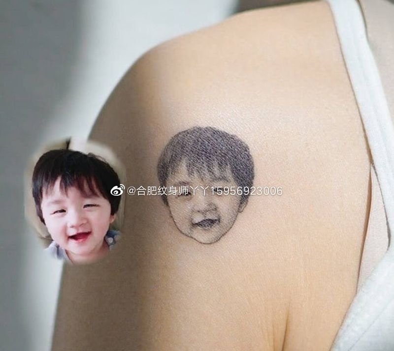 人物肖像纹身图片_肩部欧美写实人物肖像纹身图案