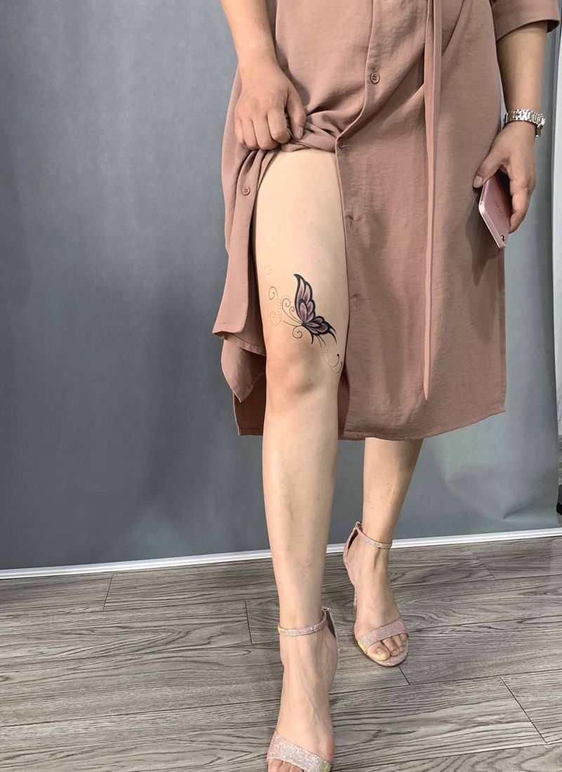 蝴蝶遮盖疤痕纹身图片_腿部New School蝴蝶遮盖疤痕纹身图案