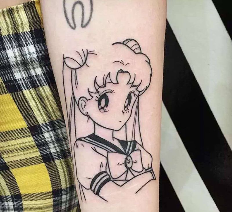 水冰月纹身图片_手臂卡通人物纹身图案