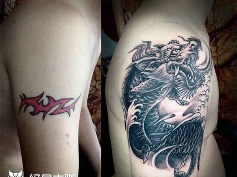 遮盖老纹身纹身图片_成品手臂传统动物鱼遮盖老纹身图案