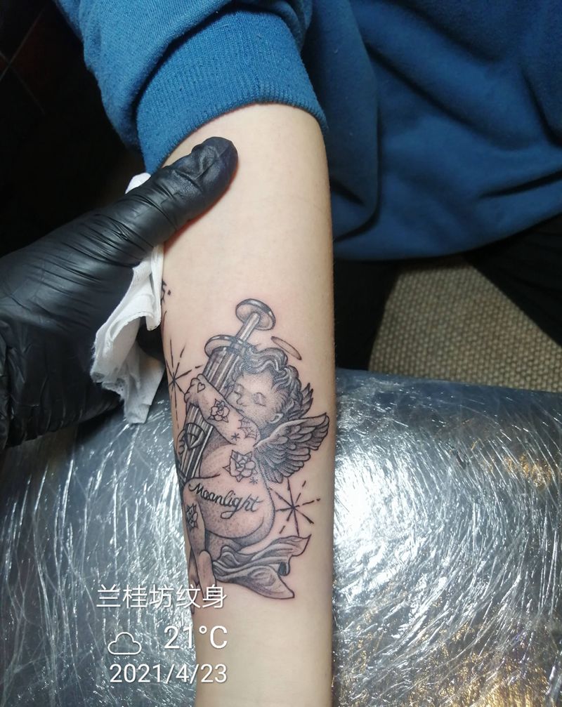 点刺纹身图片_手臂手部点刺水墨纹身图案