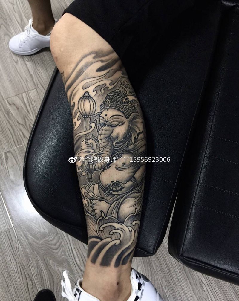 小腿象神纹身图片_成品腿部传统宗教动物纹身图案