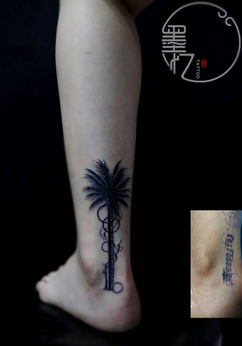 小腿椰子树遮盖纹身图片