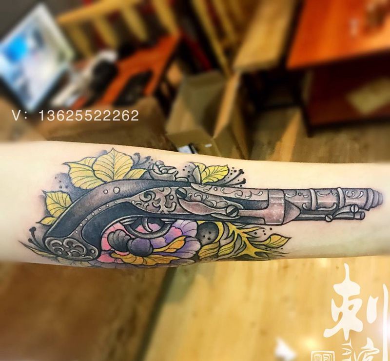 枪花纹身图片