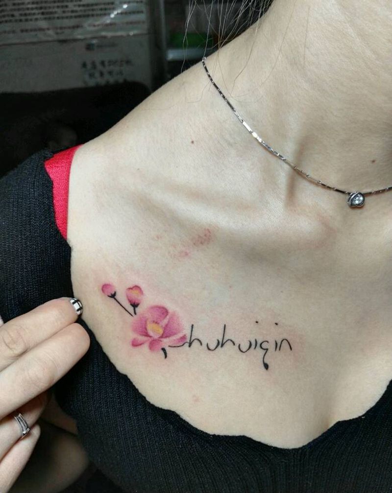 小花加字母。纹身图片