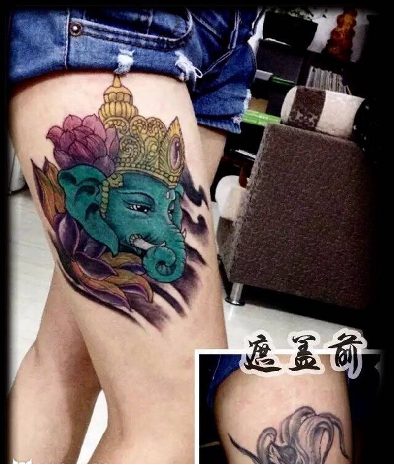 彩色遮盖大腿老纹身纹身图片