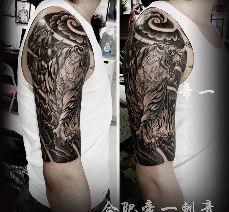 手臂虎纹身纹身图片_成品手臂传统动物纹身图案
