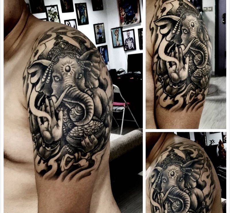 手臂象神纹身图片