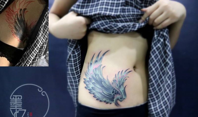 翅膀遮盖纹身图片